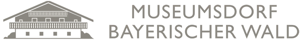 Das Museumsdorf Logo in der Farbe Taupe
